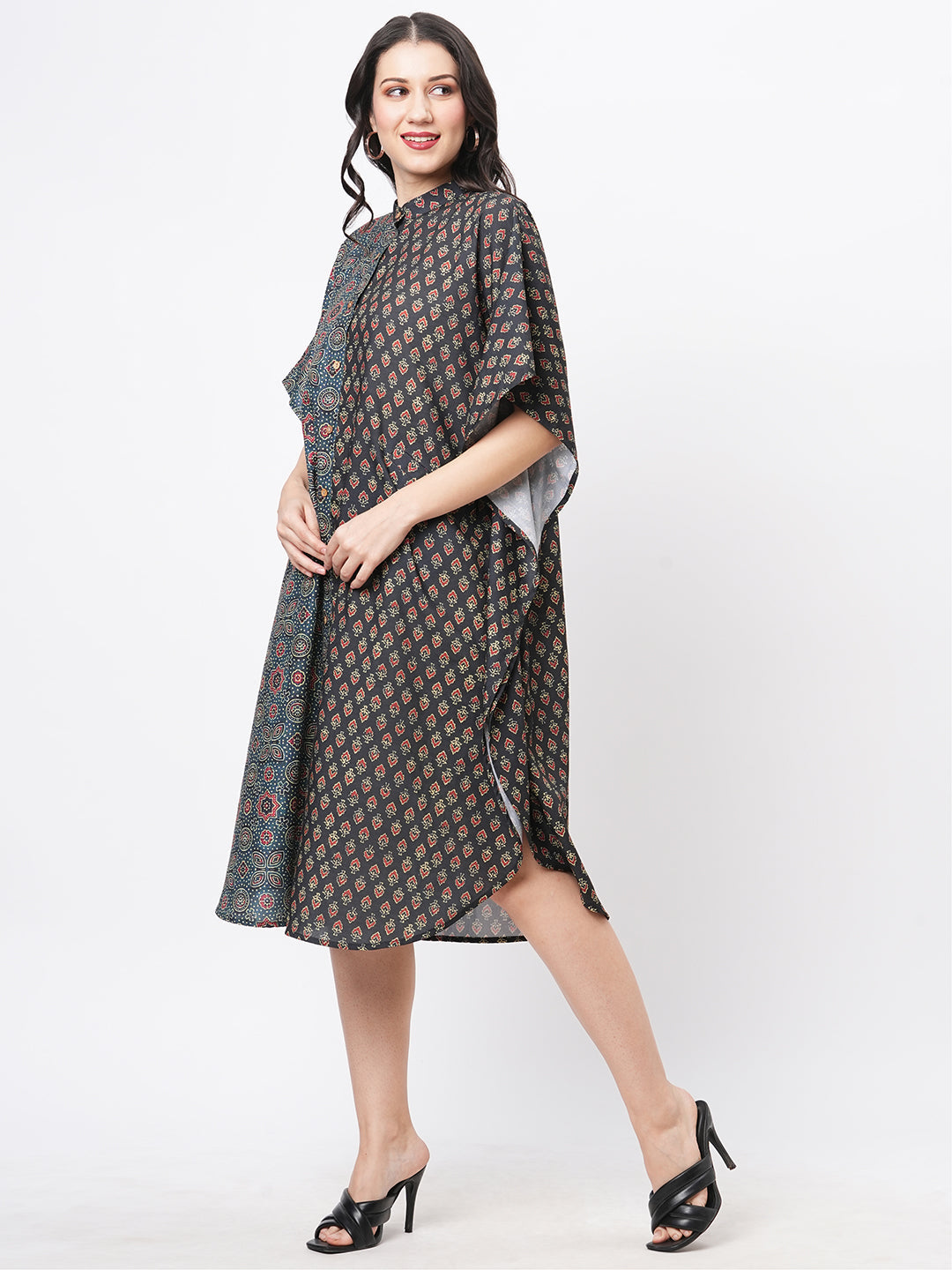 Featuring An Green Kaftan In Two Prints Complimenting Each Other With Front Button Placket