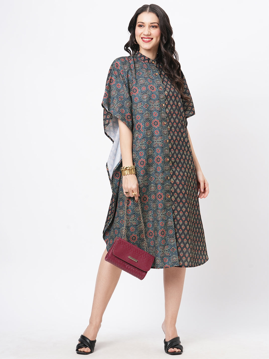 Featuring An Green Kaftan In Two Prints Complimenting Each Other With Front Button Placket