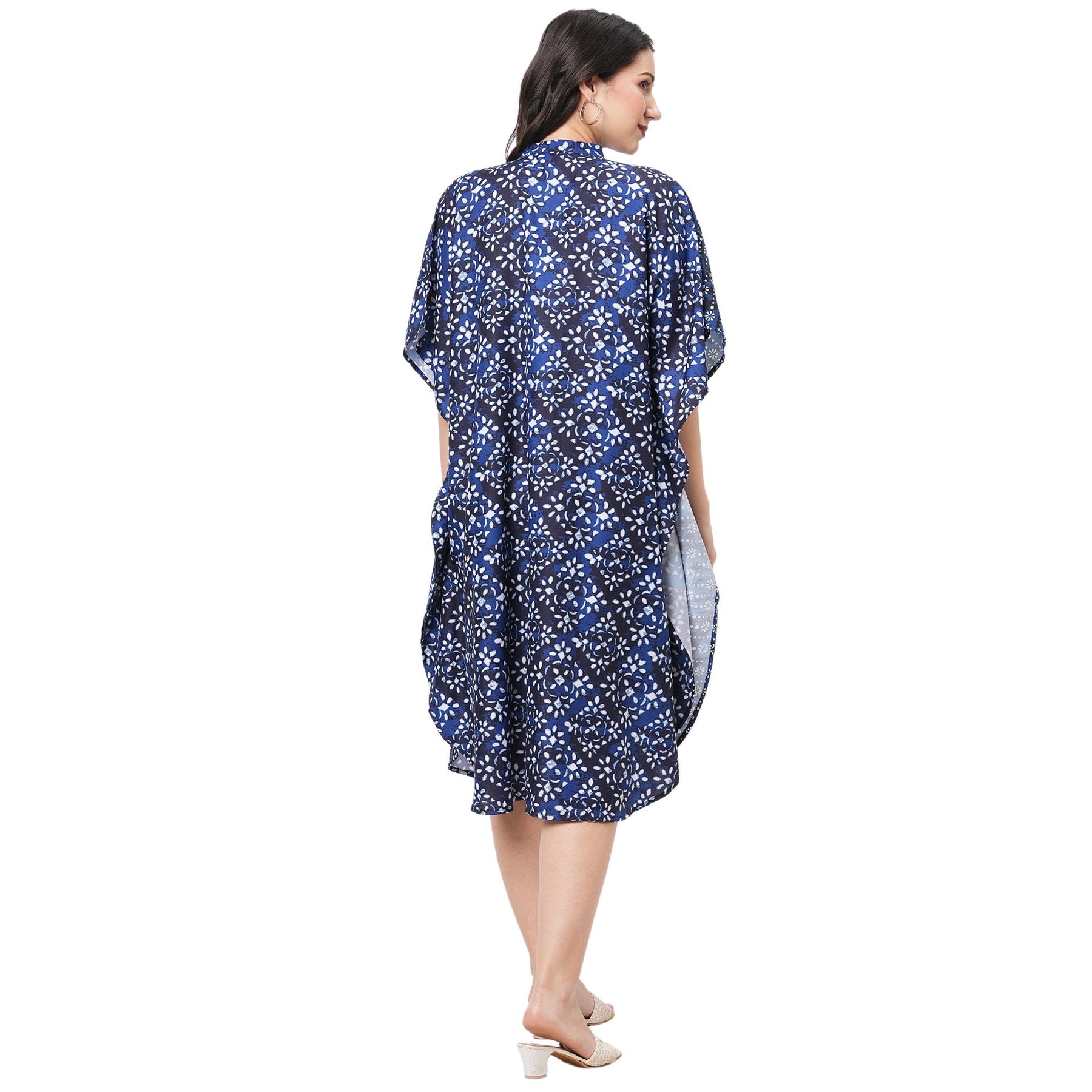 Featuring An Indigo Kaftan In Two Prints Complimenting Each Other With Front Button Placket