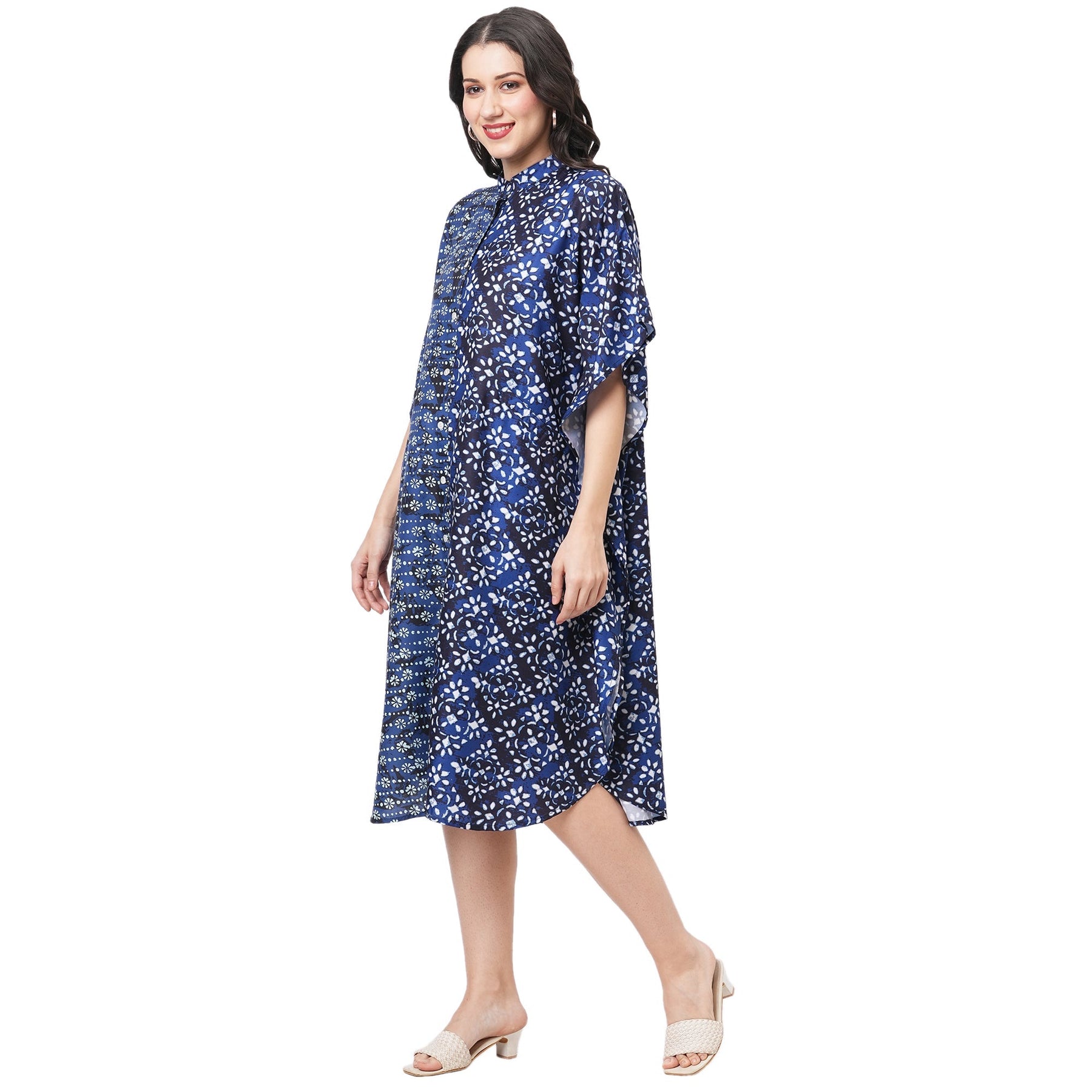 Featuring An Indigo Kaftan In Two Prints Complimenting Each Other With Front Button Placket