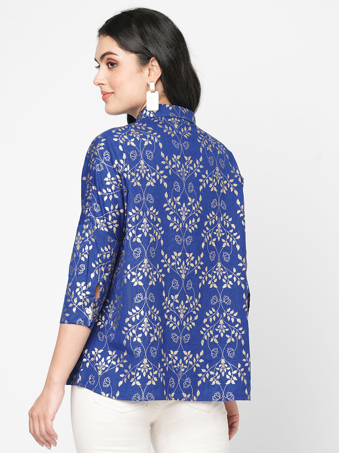 #Be Abhinaya Featuring a foliage gold print confort fit shirt with drop shoulder that moves from Nine to wine