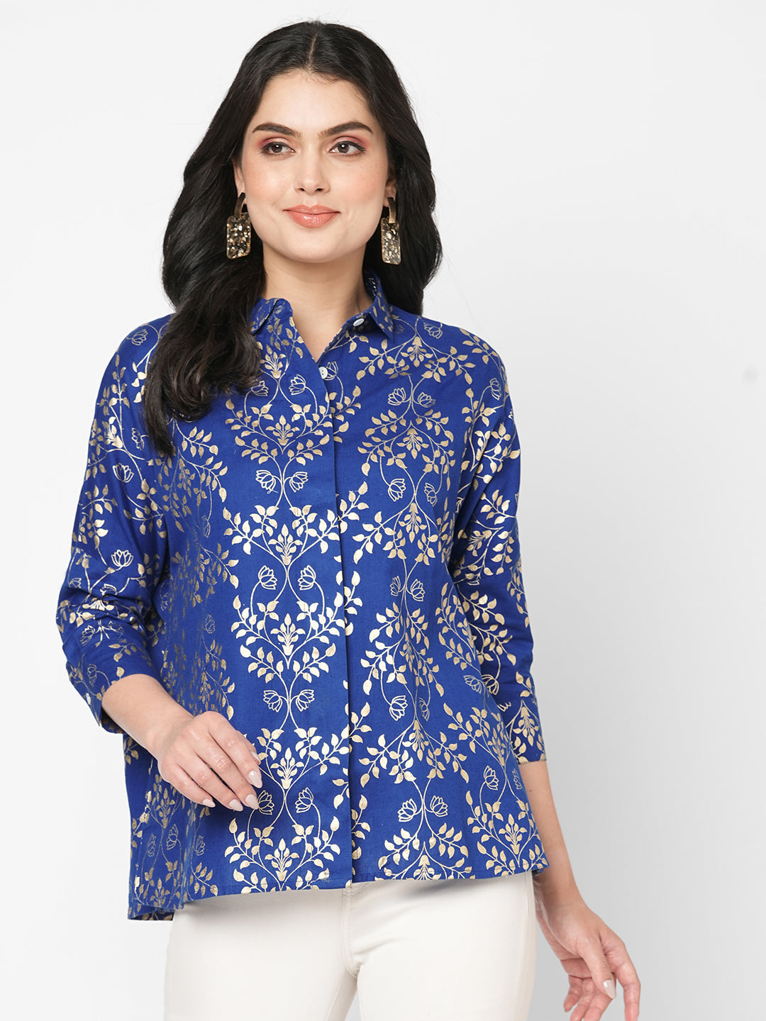 #Be Abhinaya Featuring a foliage gold print confort fit shirt with drop shoulder that moves from Nine to wine