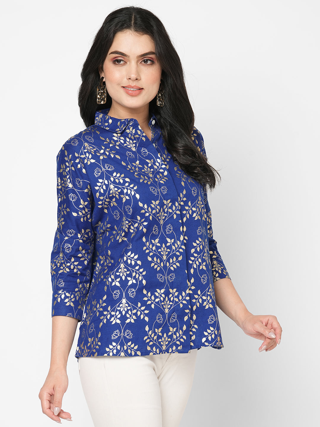 #Be Abhinaya Featuring a foliage gold print confort fit shirt with drop shoulder that moves from Nine to wine