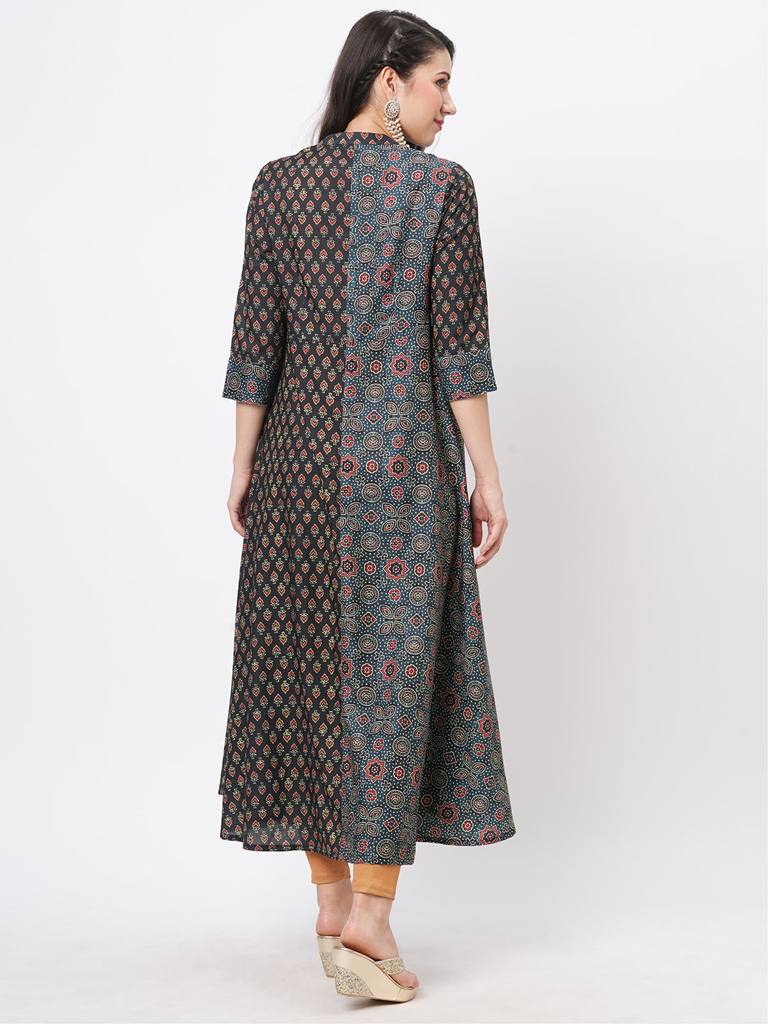Forest Green Two Print Long Flared Kurta Complimenting Each Other With Contrast Color Tassel At The Neck.