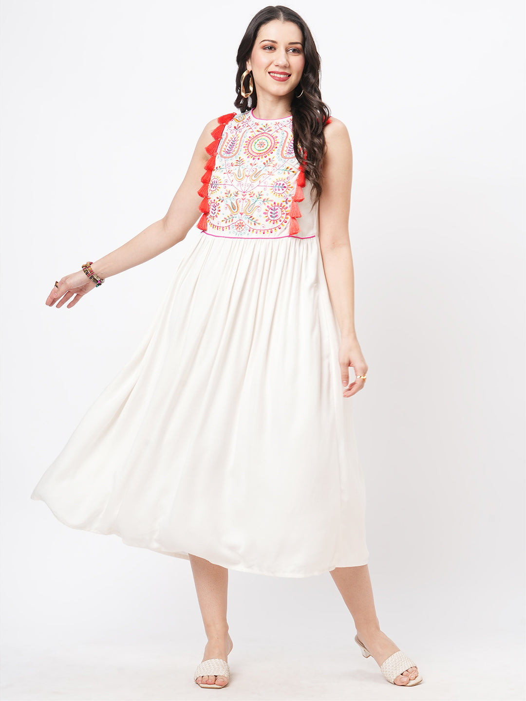 Featuring a Offwhite boho calf length airy dress with tassel and embroideryBoho Chic Romance: Flowy Silhouette Dress with Mexican Motif Embroidery | Daily Wear |HashtagBe Featuring a Offwhite boho calf length airy dress with tassel and embroideryBoho Chic Romance: Flowy Silhouette Dress with Mexican Motif Embroidery | Daily Wear |HashtagBe