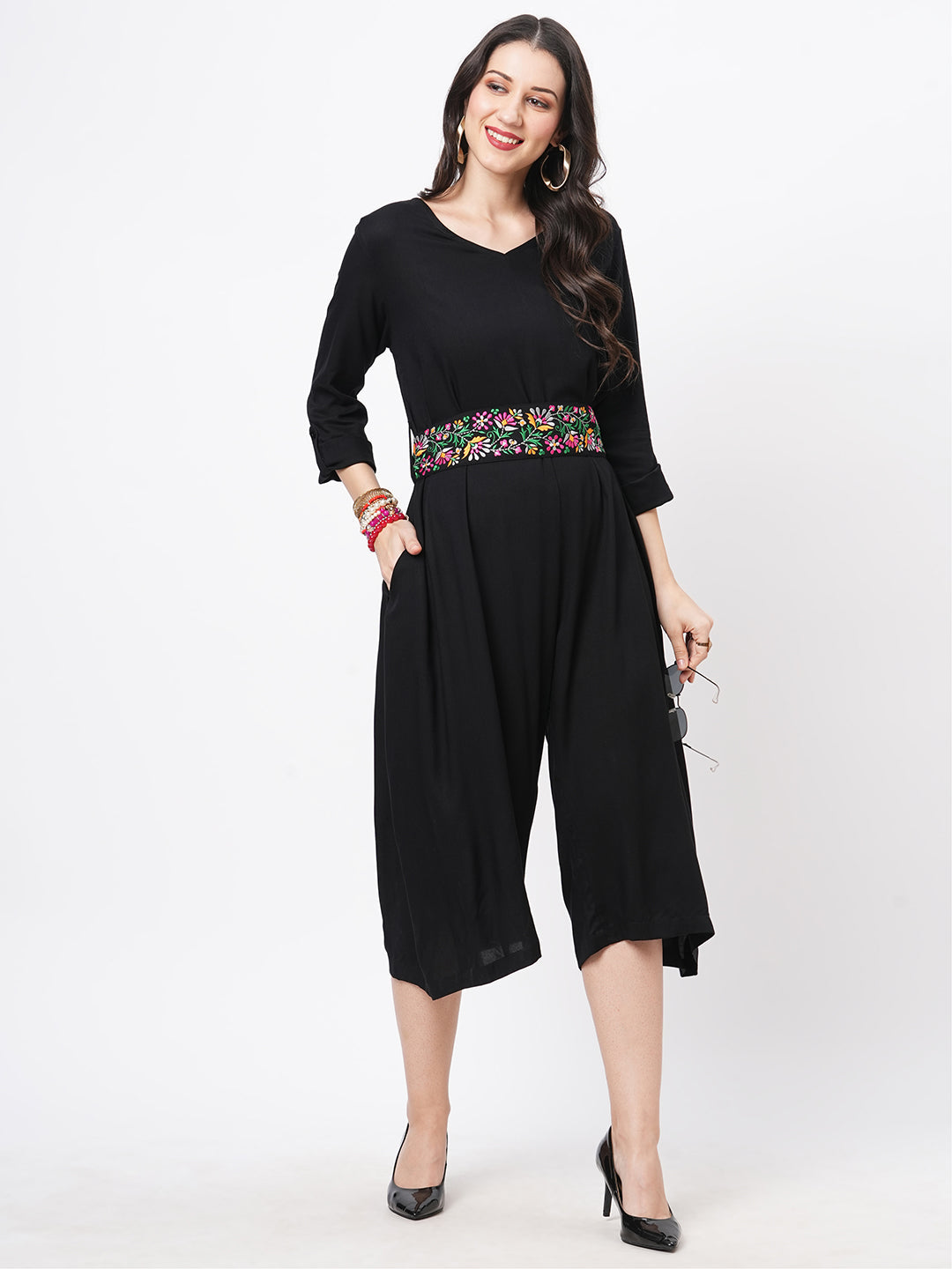 Featuring Black Viscose Rayon Calf Length Jumpsuit With Emmbroidered Belt.