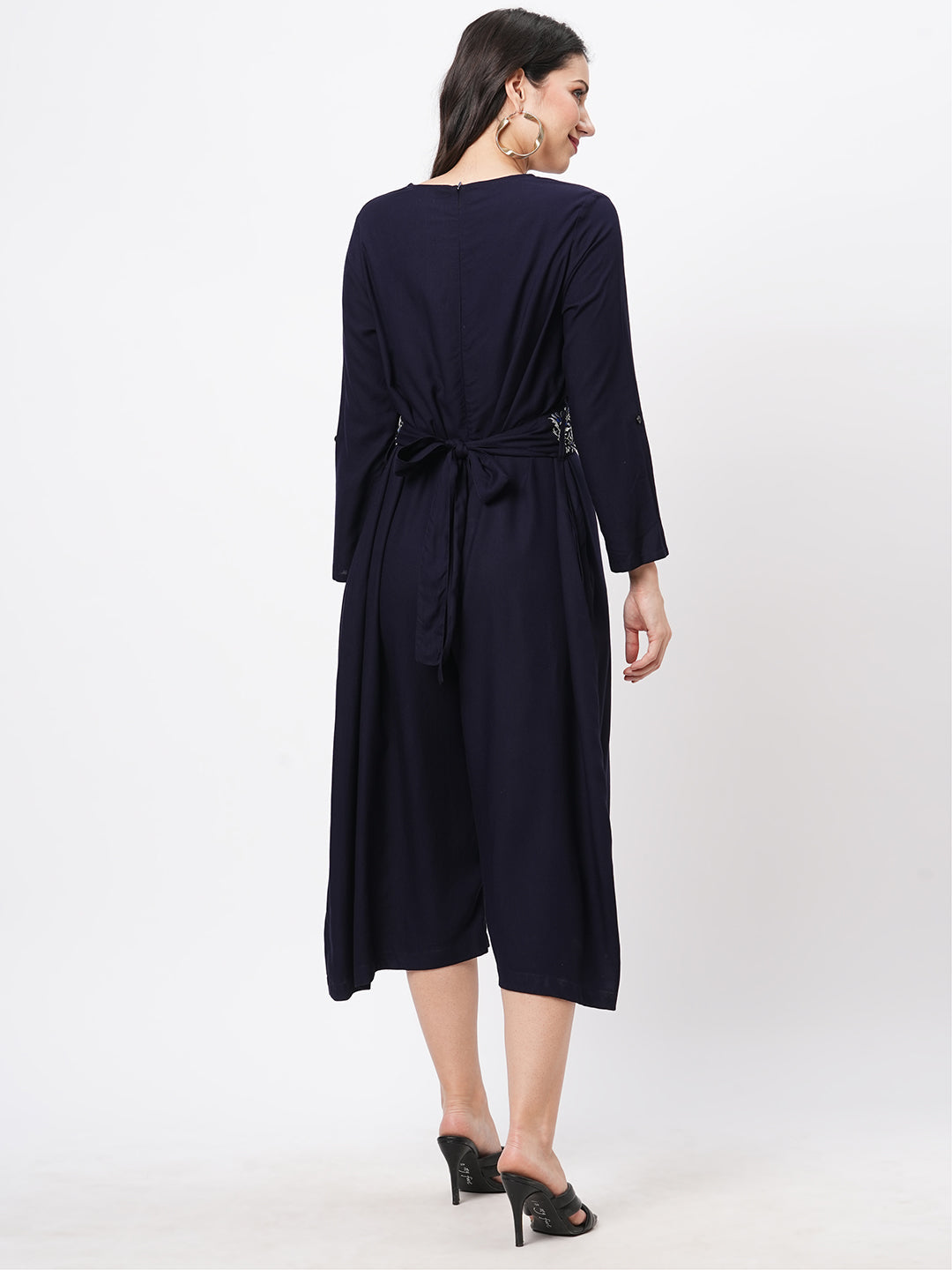Featuring Navy Viscose Rayon Calf Length Jumpsuit With Emmbroidered Belt.
