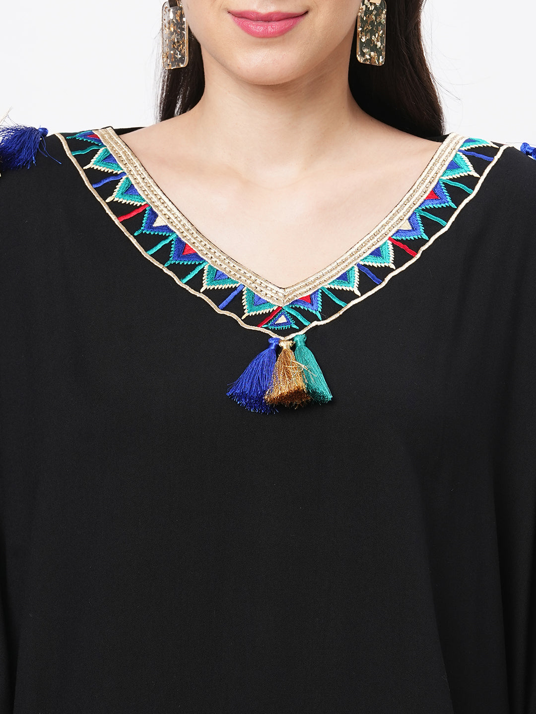 #Be featuring a black kaftan in viscose base with multi color tassel detailing
