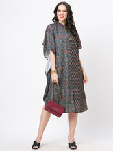 Featuring An Green Kaftan In Two Prints Complimenting Each Other With Front Button Placket