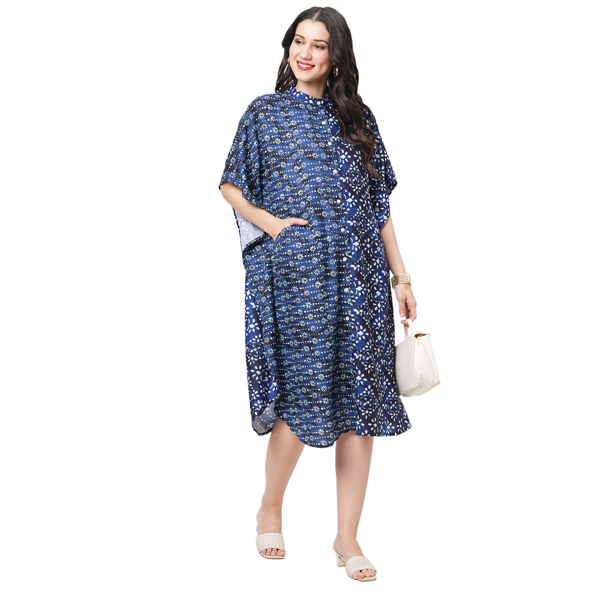 Featuring An Indigo Kaftan In Two Prints Complimenting Each Other With Front Button Placket