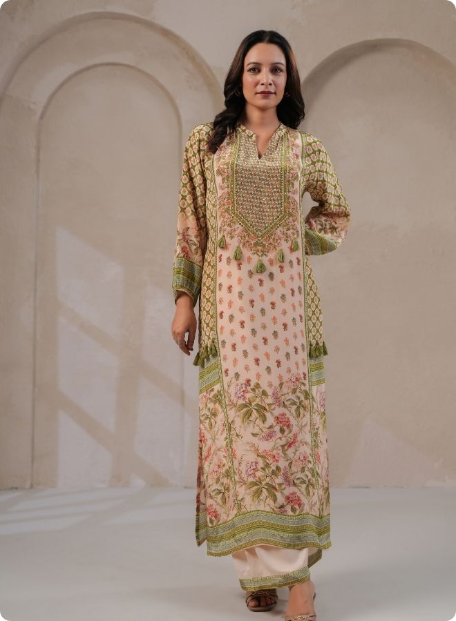 a pastel floral and geometric printed coord set with a long kurta and matching trousers