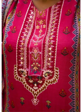 Vibrant Fuchsia Ethnic Wear Against Traditional Indian Architecture