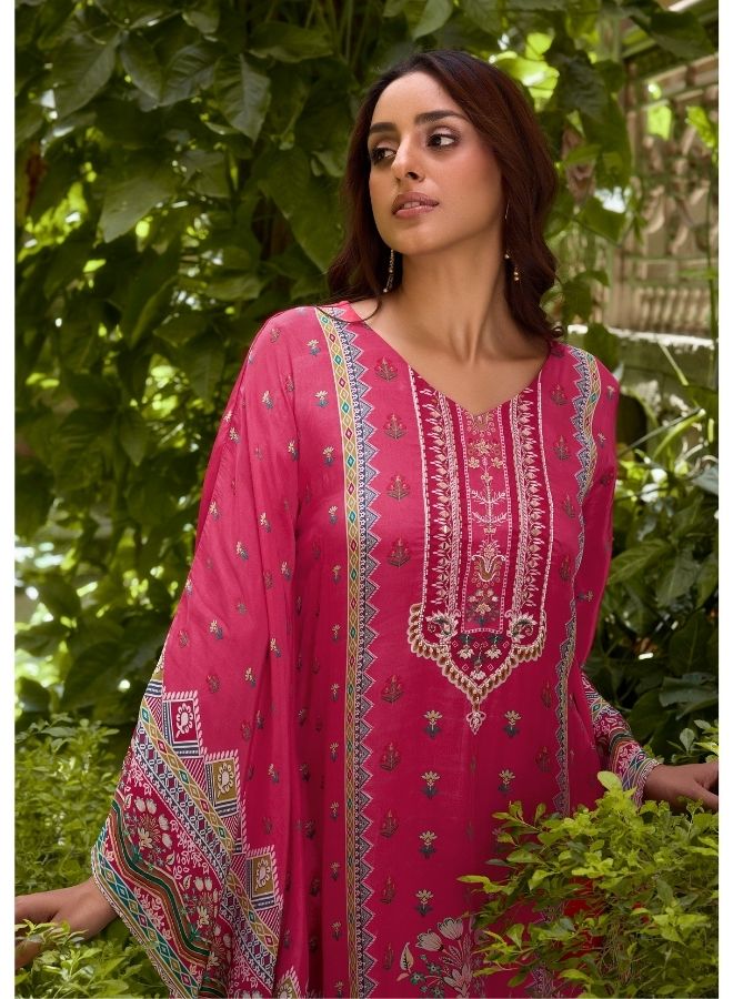 Vibrant Fuchsia Ethnic Wear Against Traditional Indian Architecture