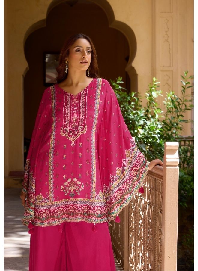 Vibrant Fuchsia Ethnic Wear Against Traditional Indian Architecture