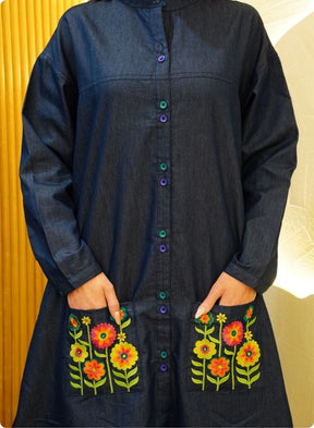 Featuring soft denim with front button shirt dress and embroidered pockets
