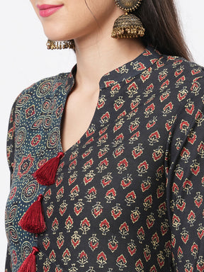 Forest Green Two Print Long Flared Kurta Complimenting Each Other With Contrast Color Tassel At The Neck.