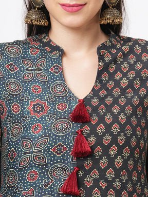 Forest Green Two Print Long Flared Kurta Complimenting Each Other With Contrast Color Tassel At The Neck.