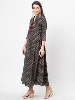 Forest Green Two Print Long Flared Kurta Complimenting Each Other With Contrast Color Tassel At The Neck.