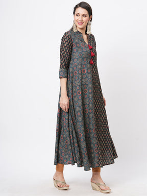 Forest Green Two Print Long Flared Kurta Complimenting Each Other With Contrast Color Tassel At The Neck.