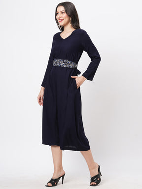 Featuring Navy Viscose Rayon Calf Length Jumpsuit With Emmbroidered Belt.