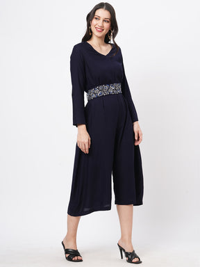 Featuring Navy Viscose Rayon Calf Length Jumpsuit With Emmbroidered Belt.