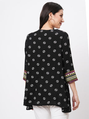 Boho-Chic Black Printed Tunic With Contrast Embroidered Linear Yoke And Fuschia Pink Tassels