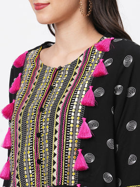 Boho-Chic Black Printed Tunic With Contrast Embroidered Linear Yoke And Fuschia Pink Tassels