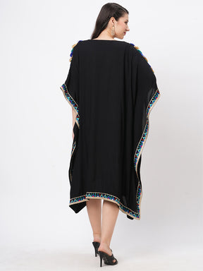 #Be featuring a black kaftan in viscose base with multi color tassel detailing