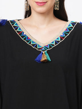 #Be featuring a black kaftan in viscose base with multi color tassel detailing