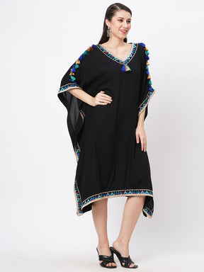 #Be featuring a black kaftan in viscose base with multi color tassel detailing